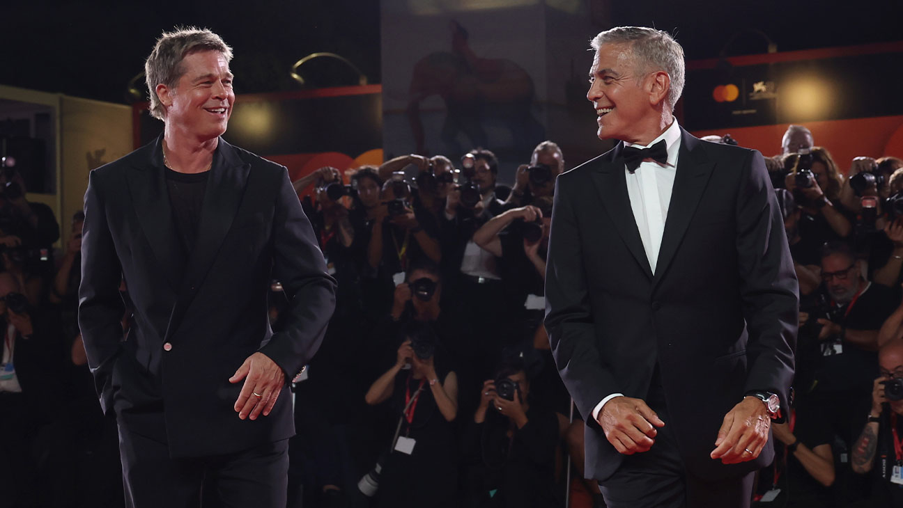 (L-R) Brad Pitt and George Clooney at the 2024 Venice Film Festival premiere of 'Wolfs.'