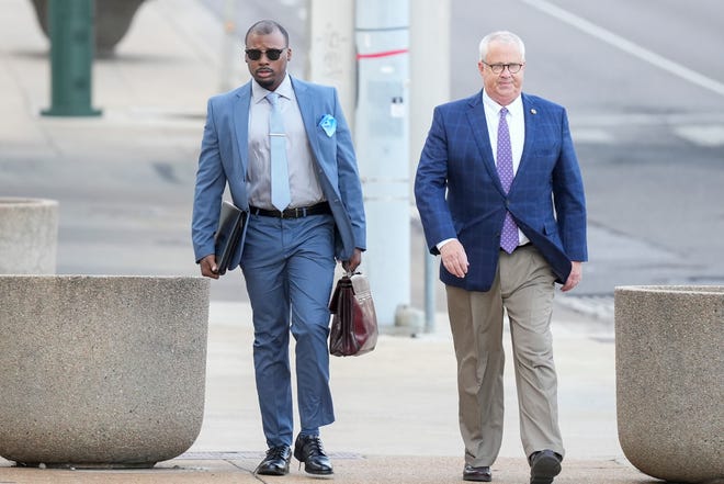 Justin Smith Jr., one of the former Memphis Police Department officers charged with the death of Tyre Nichols, walks up to the Odell Horton Federal Building with his attorney on the second day of the trial in Memphis, Tenn., on Tuesday, September 10, 2024.