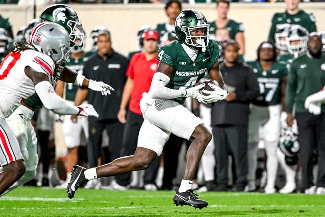 Michigan State's Jaron Glover catches a touchdown pass against Ohio State during the second quarter on Saturday, Sept. 28, 2024, at Spartan Stadium in East Lansing.