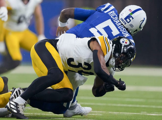 Pittsburgh Steelers safety Minkah Fitzpatrick (39) brings down Indianapolis Colts quarterback Anthony Richardson (5) Sunday, Sept. 29, 2024, during a game against the Pittsburgh Steelers at Lucas Oil Stadium in Indianapolis. The play resulted in an injury for Richardson.