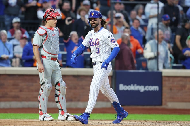 New York Mets outfielder Jesse Winker (3) celebrates after hitting a solo home run in the fourth inning against the Philadelphia Phillies during game three of the NLDS for the 2024 MLB Playoffs on Oct. 8, 2024, at Citi Field.