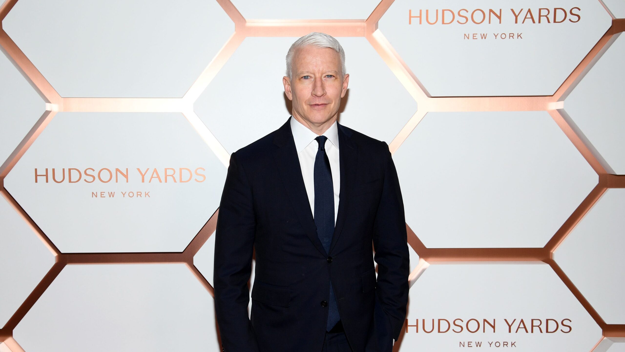 Anderson Cooper hit by debris