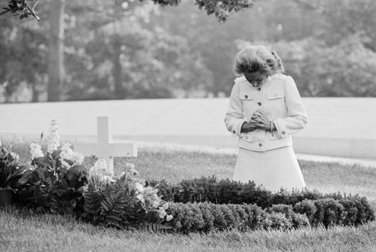 Ethel Kennedy Kneeling at Husband Robert F. Kennedy Gravesite