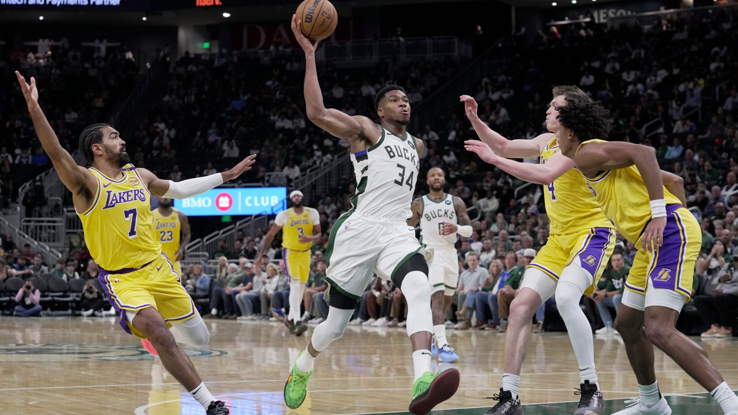 Giannis scores 20 in preseason debut, Bucks lose to Lakers 107-102