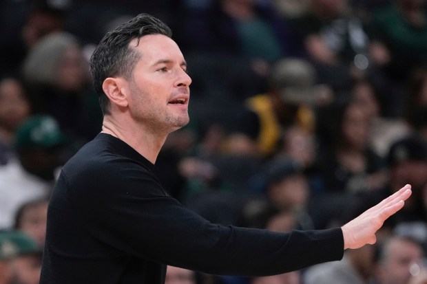 Lakers head coach JJ Redick reacts on the sideline during...