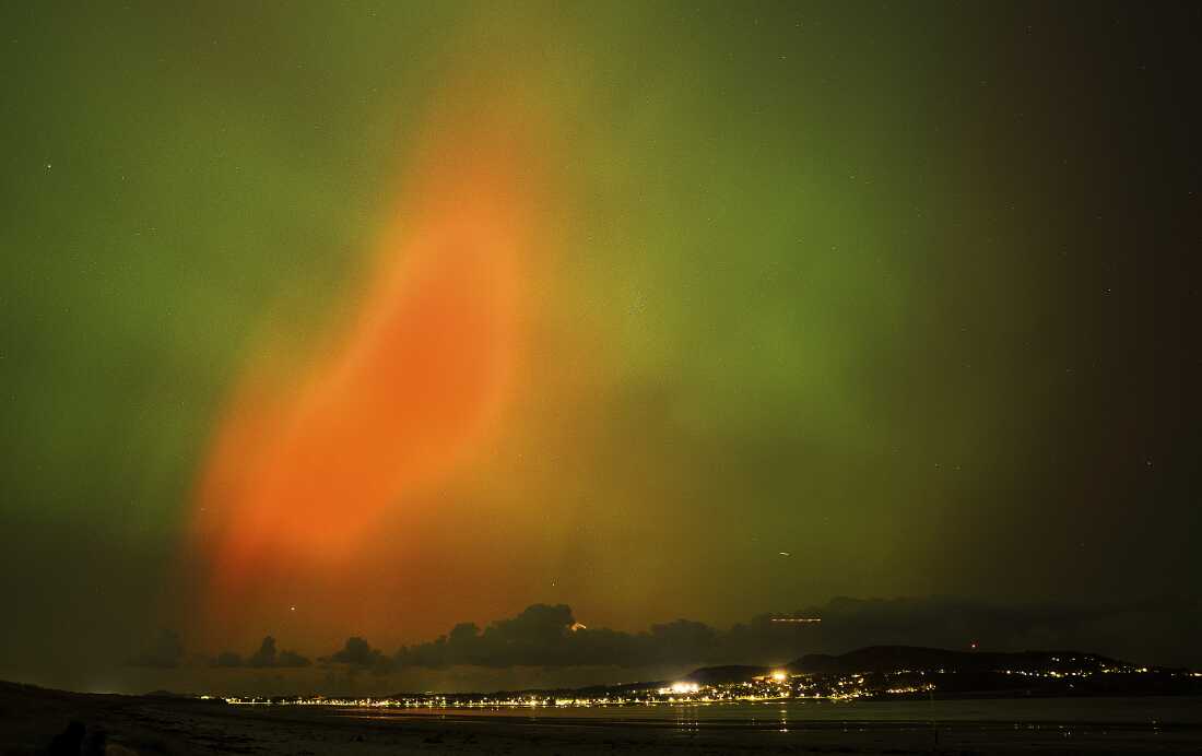 The northern lights, also known as the aurora borealis, are seen on display in the skies over Dublin on Oct. 10.