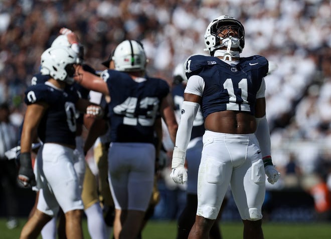 Penn State defensive end Abdul Carter (11) reacts after tackling UCLA running back Jalen Berger (0) during a game on Oct. 5, 2024.