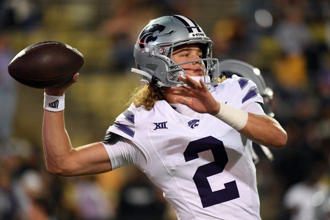 Oct 12, 2024; Boulder, Colorado, USA; Kansas State Wildcats quarterback Avery Johnson (2) warms up before the game against the Colorado Buffaloes at Folsom Field. Mandatory Credit: Christopher Hanewinckel-Imagn Images