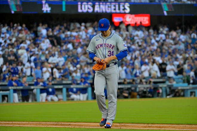 New York Mets pitcher Kodai Senga (34) reacts after being pulled from the mound against the Los Angeles Dodgers in the second inning during game one of the NLCS for the 2024 MLB Playoffs on Oct. 13, 2024, at Dodger Stadium.