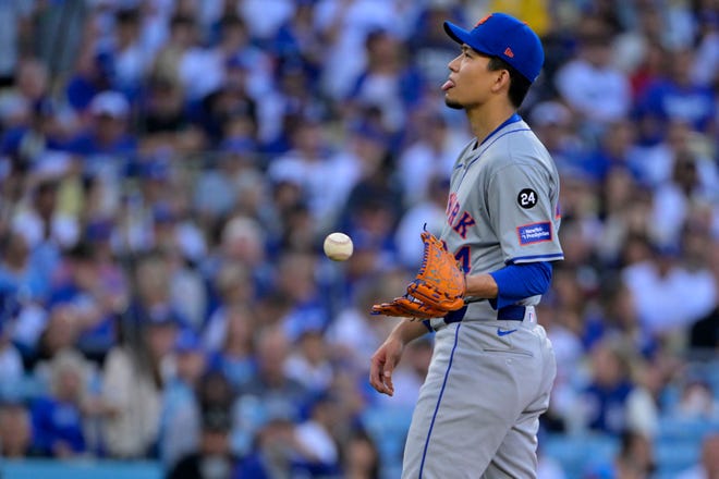 New York Mets pitcher Kodai Senga (34) reacts against the Los Angeles Dodgers during the first inning in game one of the NLCS for the 2024 MLB Playoffs on Oct. 13, 2024, at Dodger Stadium.