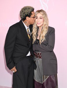 Cher and Alexander Edwards at the Victoria's Secret Fashion Show on Oct. 15 in New York, the attico, off-white, blond, bedazzled bodysuit