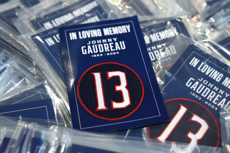 Number 13 in honor of Johnny Gaudreau patch handed out to fans before the game between the Columbus Blue Jackets and the Florida Panthers  at Nationwide Arena on Oct. 15, 2024 in Columbus, Ohio. 