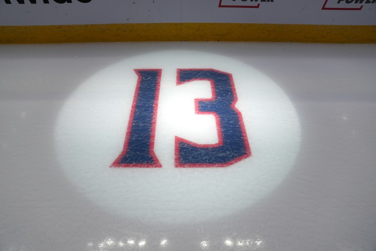 Number 13 in honor of Johnny Gaudreau displayed on ice before the game during the Oct. 15, 2024 game in Columbus, Ohio. 