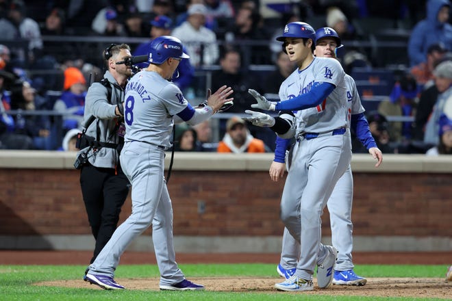 Oct 16, 2024; New York City, New York, USA; Los Angeles Dodgers two-way player Shohei Ohtani (17) reacts after hitting a three run home run in the eighth inning during game three of the NLCS for the 2024 MLB playoffs on Oct. 16, 2024, at Citi Field.