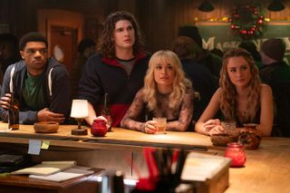 four college kids sit at the bar at a dive bar in the tv show tell me lies