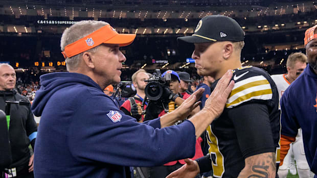 Denver Broncos head coach Sean Payton greets New Orleans Saints quarterback Spencer Rattler (18) after the Broncos defeated t