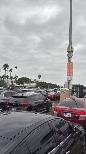 Fans arrive at Hard Rock Stadium in Miami Gardens for Night of Taylor Swift's Eras Tour.