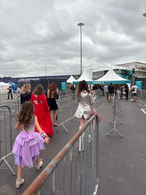 Taylor Swift fans arrive at Hard Rock Stadium in Miami Gardens for Night 1 of the Eras Tour's return to North America.