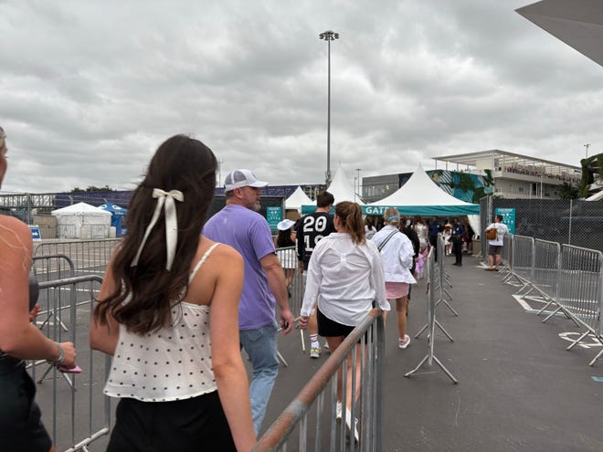 Taylor Swift fans arrive at Hard Rock Stadium in Miami Gardens for Night 1 of the Eras Tour's return to North America.