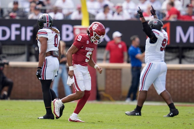 Oklahoma Sooners quarterback Michael Hawkins Jr. (9) walks off the field after throwing an interception that was returned for a touchdown during a college football game between the University of Oklahoma Sooners (OU) and the South Carolina Gamecocks at Gaylord Family - Oklahoma Memorial Stadium in Norman, Okla., Saturday, Oct. 19, 2024.