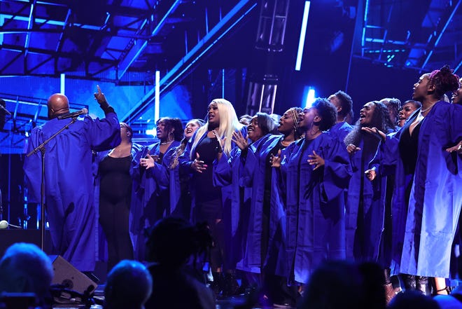 CLEVELAND, OHIO - OCTOBER 19: A choir performs onstage during the 2024 Rock & Roll Hall Of Fame Induction Ceremony streaming on Disney+ at Rocket Mortgage Fieldhouse on October 19, 2024 in Cleveland, Ohio. (Photo by Theo Wargo/Getty Images for The Rock and Roll Hall of Fame)