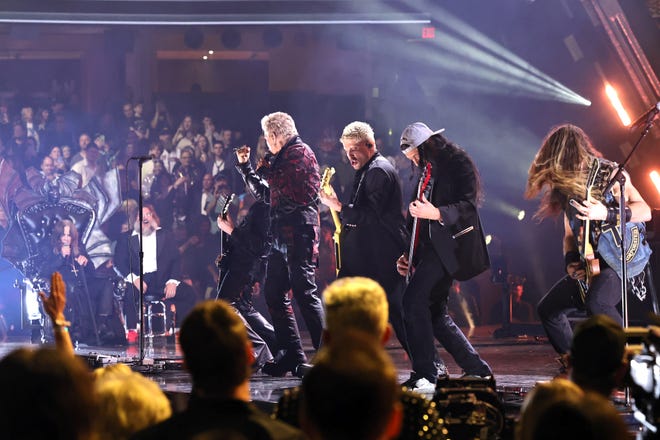 CLEVELAND, OHIO - OCTOBER 19: (L-R) Inductee, Ozzy Osbourne and Jack Black watch Billy Idol, Andrew Watt, Robert Trujillo and Zakk Wylde perform onstage during the 2024 Rock & Roll Hall Of Fame Induction Ceremony streaming on Disney+ at Rocket Mortgage Fieldhouse on October 19, 2024 in Cleveland, Ohio. (Photo by Theo Wargo/Getty Images for The Rock and Roll Hall of Fame)