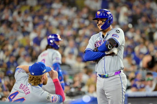 New York Mets third baseman Mark Vientos (27) celebrates with outfielder Harrison Bader (44) after hitting a two run home run in the fourth inning against the Los Angeles Dodgers during Game 6 of the NLCS for the 2024 MLB playoffs on OCt. 20, 2024, at Dodger Stadium.