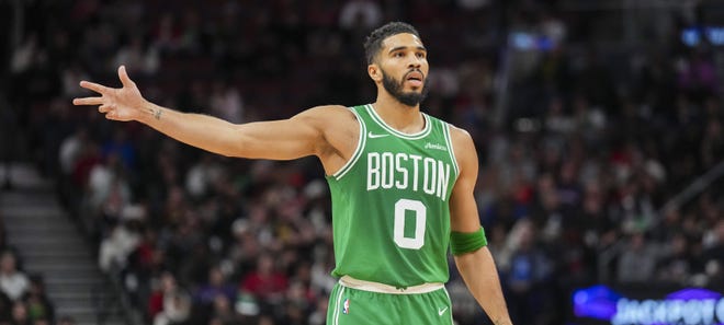 Oct 15, 2024; Toronto, Ontario, CAN; Boston Celtics forward Jayson Tatum (0) gestures against the Toronto Raptors during the first half at Scotiabank Arena. Mandatory Credit: Kevin Sousa-Imagn Images