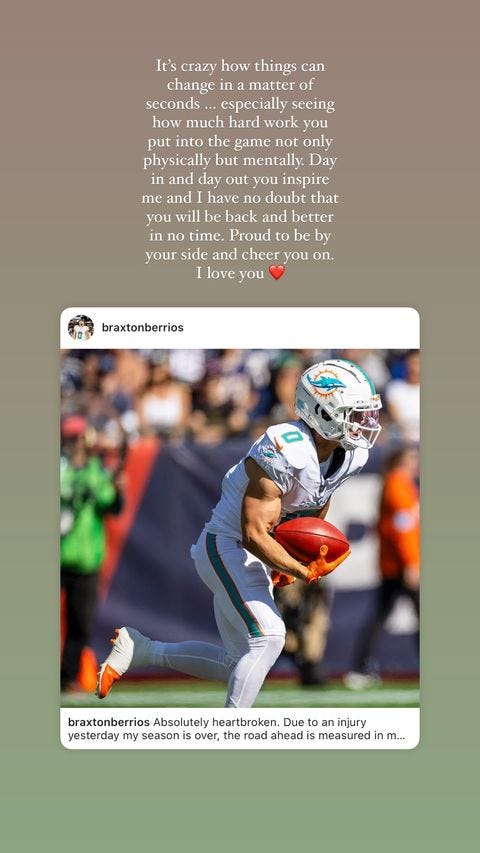 a football player wearing a miami dolphins uniform is running on the field during a game the player is focused and in motion, with teammates and spectators partially visible in the background above the scene, there are words expressing encouragement and support for a player who has faced an injury, highlighting the emotional impact of the situation