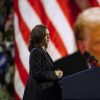 Vice President Harris plays a highlight reel of her opponent, former President Donald Trump, during a rally in Erie, Pa., on Oct. 14, 2024.