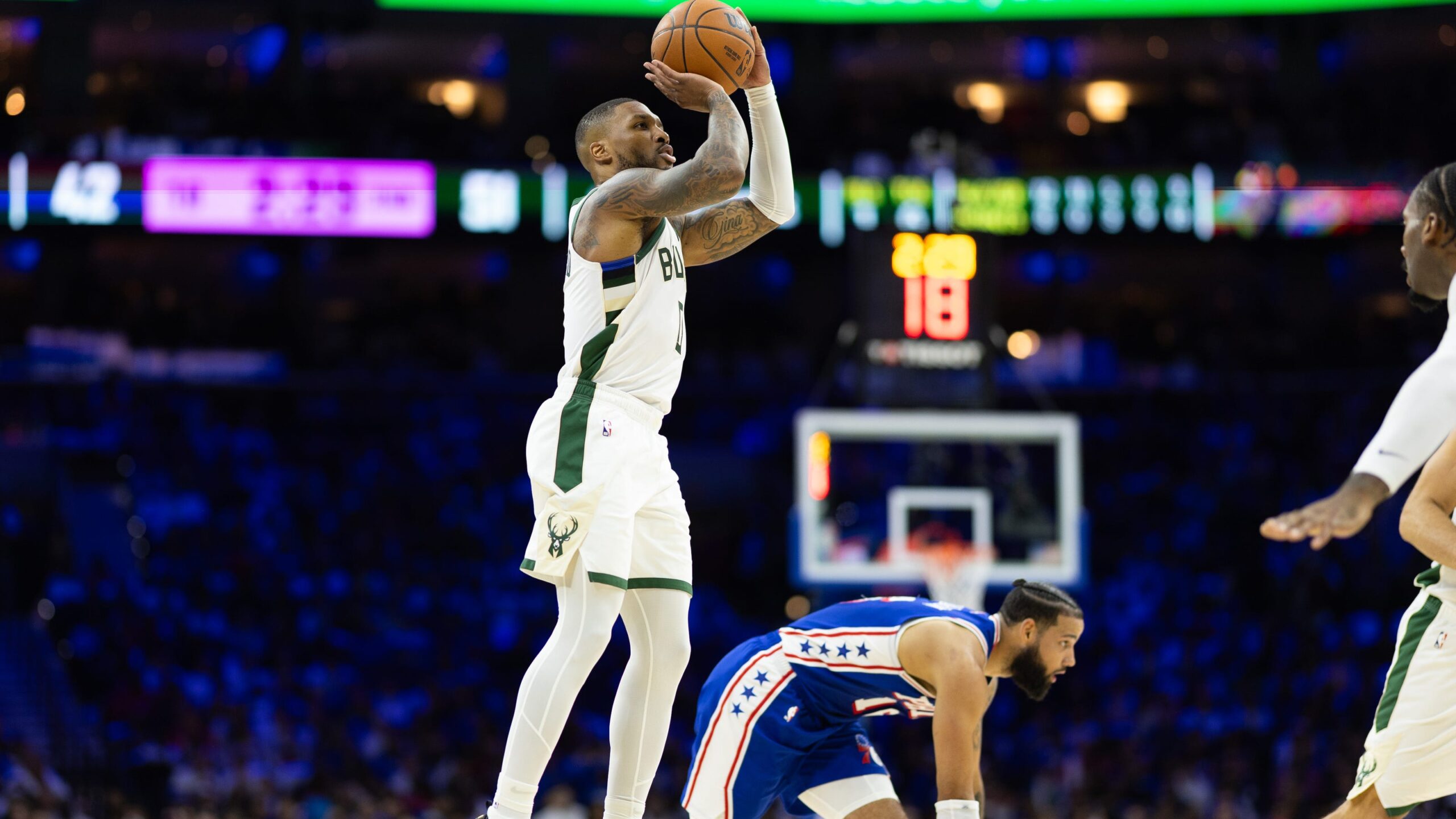 Bucks use size to dominate 76ers in 124-109 season-opening win