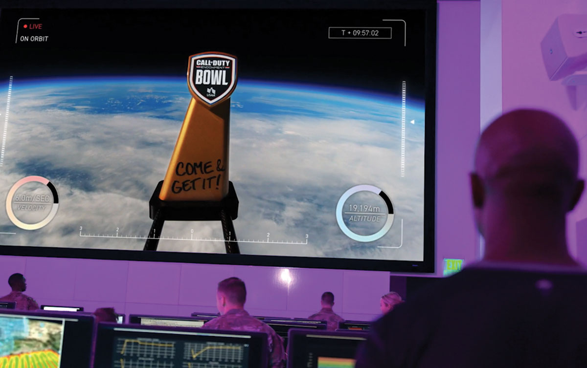 The 2021 Call of Duty trophy won by a Space Force team floats in orbit.