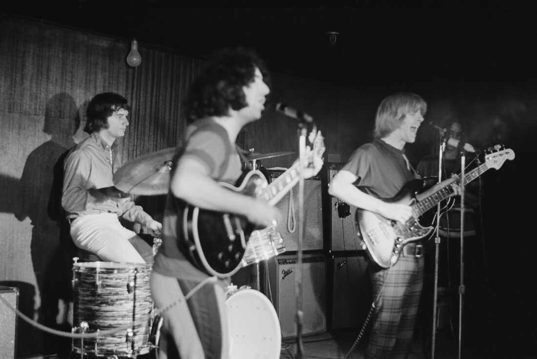 The Grateful Dead bassist Phil Lesh (right), playing with American rock band The Grateful Dead in concert, circa 1970. From left to right, drummer Bill Kreutzmann, lead singer Jerry Garcia and . (Photo by Don Paulsen/Michael Ochs Archives/Getty Images)