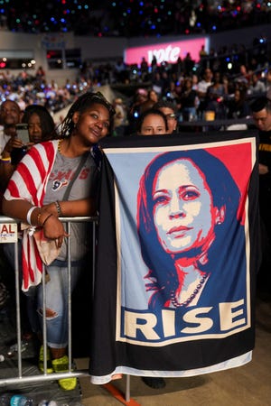 Supporters of Democratic presidential nominee Vice President Kamala Harris attend a campaign rally for Harris in Houston on October 25, 2024.