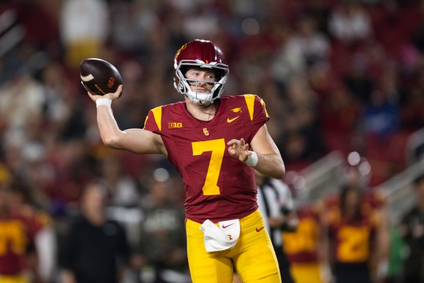 USC quarterback Miller Moss throws a pass during the first...