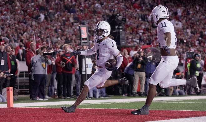 Penn State safety Jaylen Reed (1) returns an interception for a touchdown during the third quarter of their game Saturday, October 26, 2024 at Camp Randall Stadium in Madison, Wisconsin. Penn State beat Wisconsin 28-13.