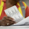 Absentee ballots are prepared to be mailed at the Wake County Board of Elections on Sept. 17 in Raleigh, N.C.