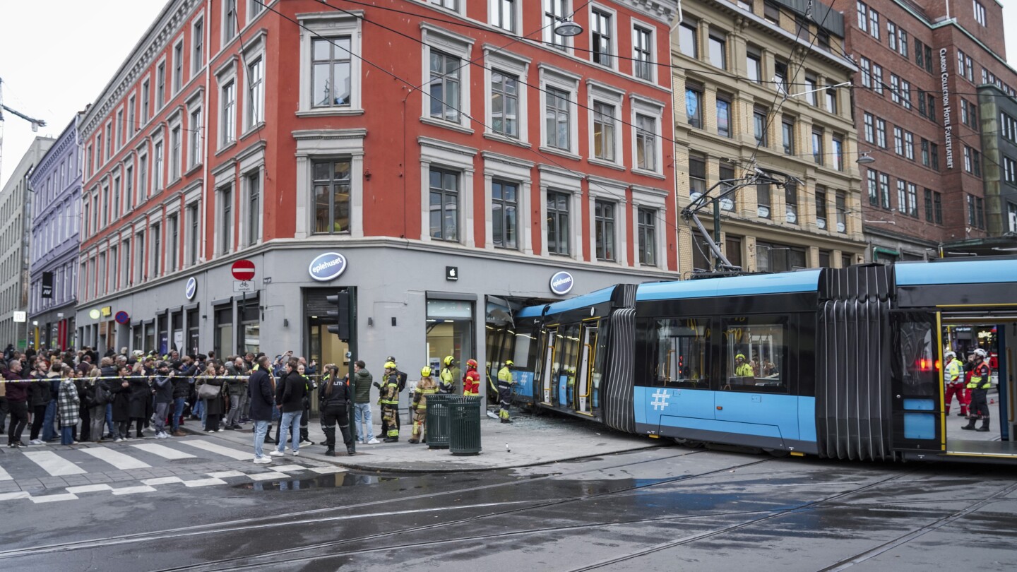 A tram derails and plows into a shop in the Norwegian capital but only 4 are lightly injured