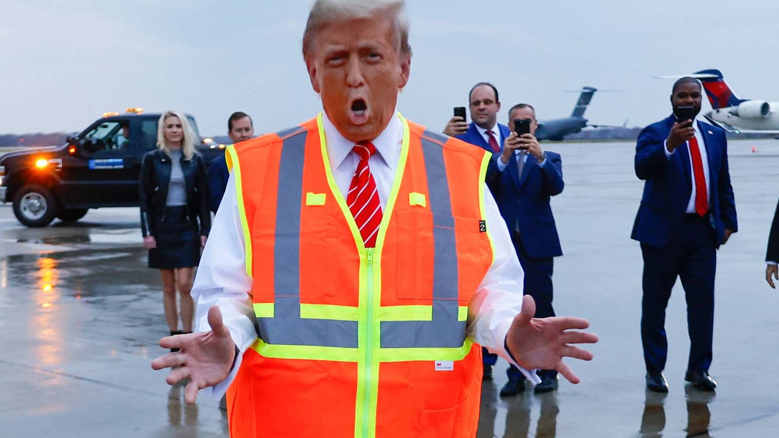 Billionaire Trump Awkwardly Dresses Up as a Garbage Truck Driver