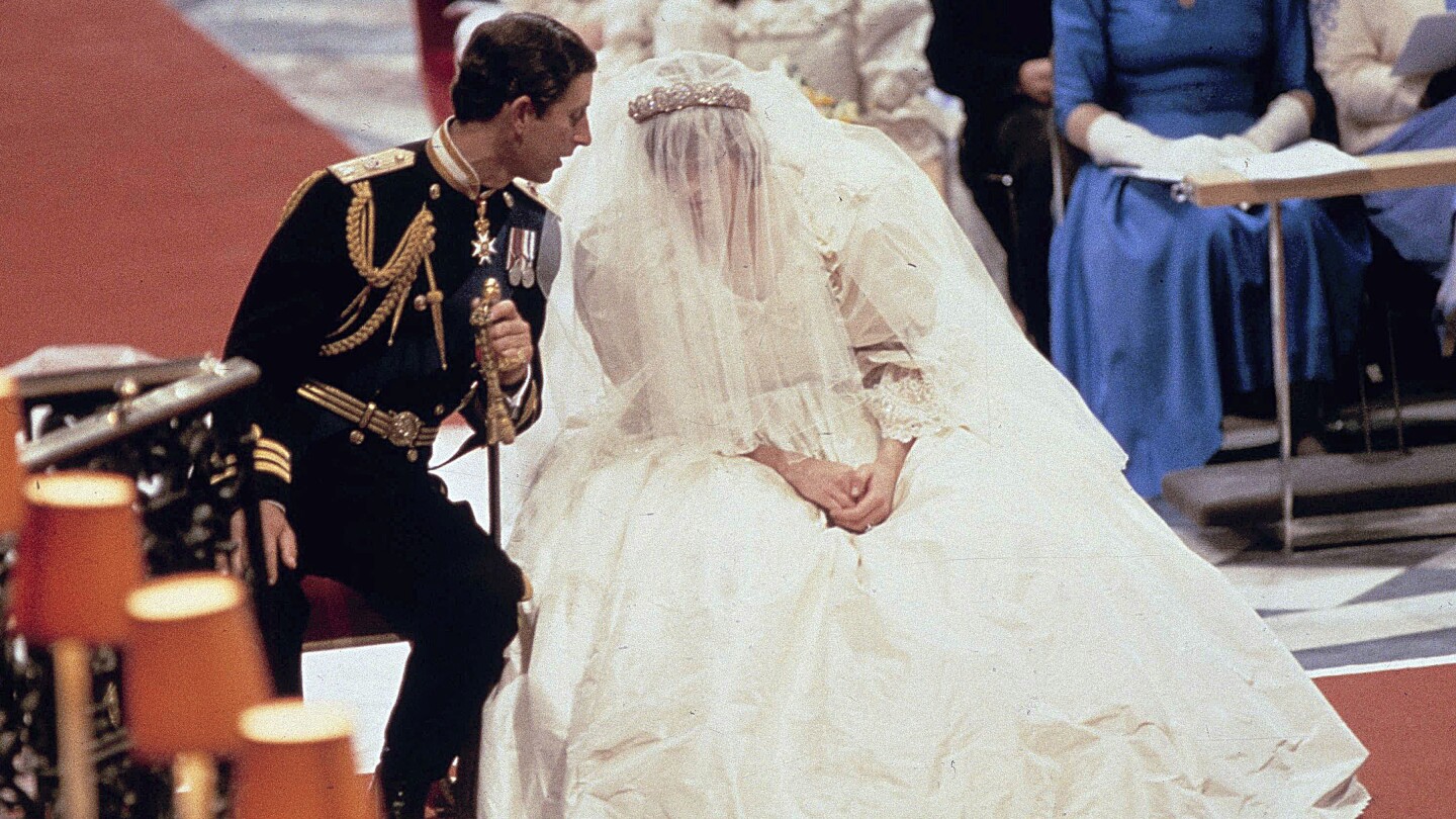 Designers of the late Princess Diana's wedding dress settle dispute over drawings of the gown