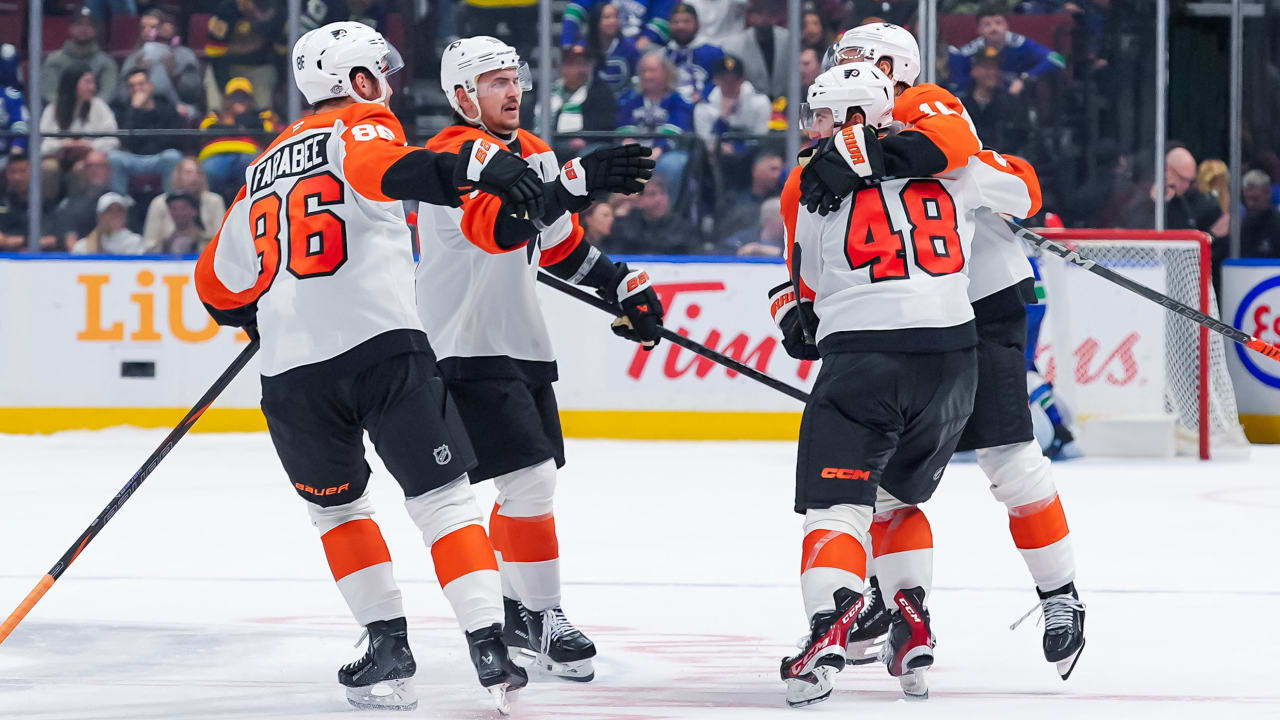 Frost scores shootout winner for Flyers in season opener against Canucks