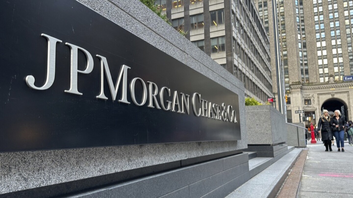 JPMorgan net income falls as bank sets aside more money to cover potential bad loans