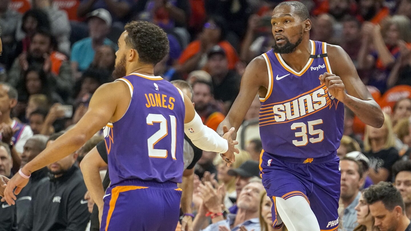 Kevin Durant scores 31, leading the Suns past the Mavericks 114-102