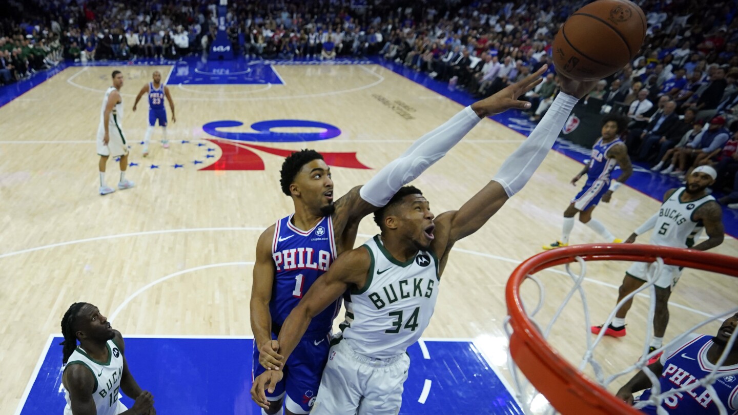 Lillard and Antetokounmpo power Bucks past short-handed 76ers 124-109