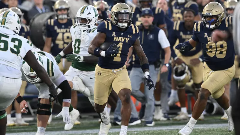 Peele returns 2 interceptions for TDs, No. 25 Navy overpowers Charlotte 51-17