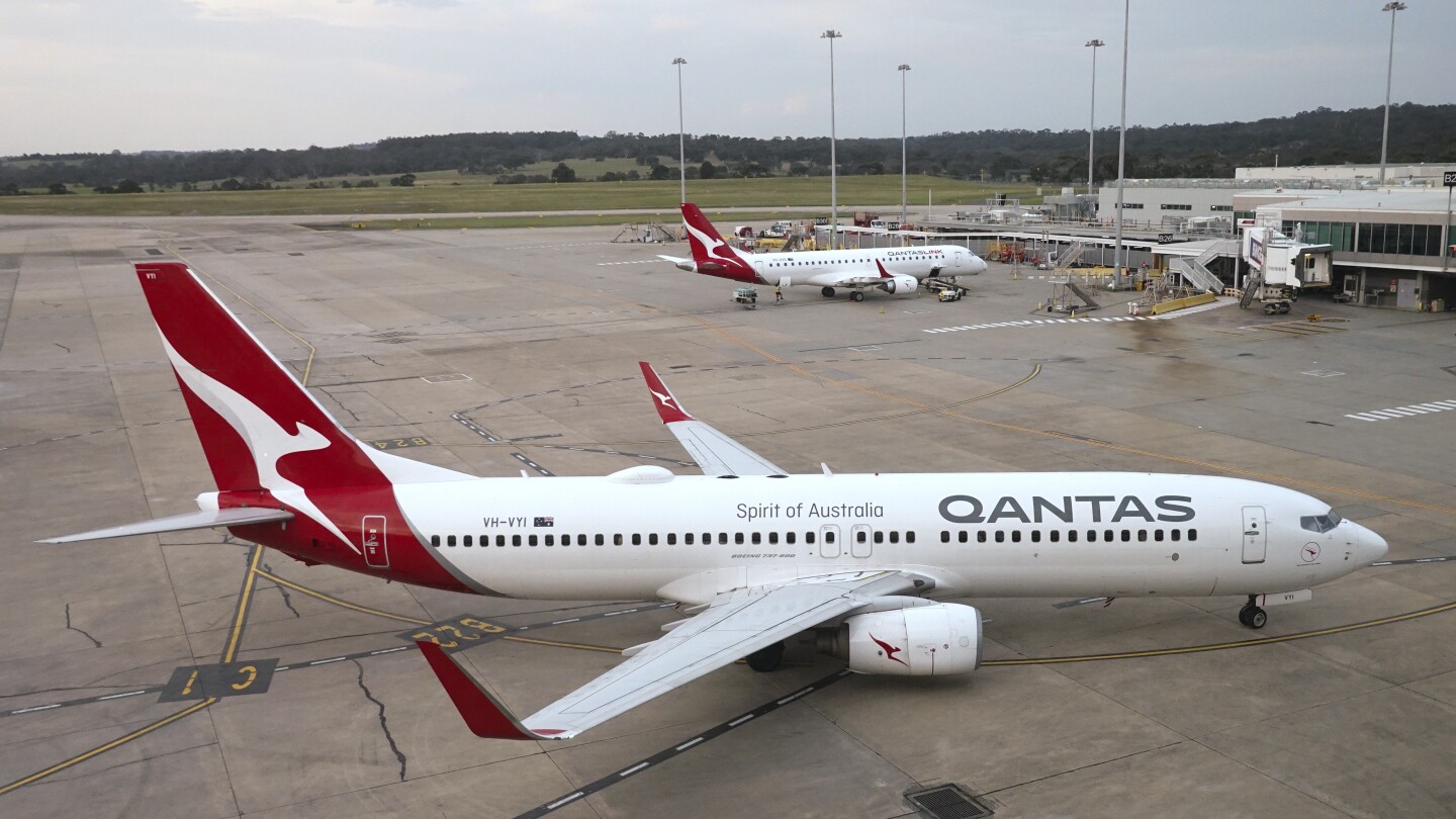 Qantas Airways apologizes after R-rated film reportedly airs on every screen during flight