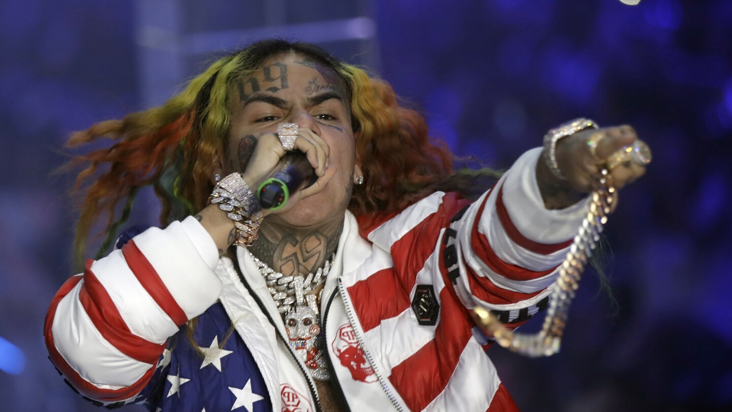 Rapper Tekashi 6ix9ine is arrested for a possible parole violation