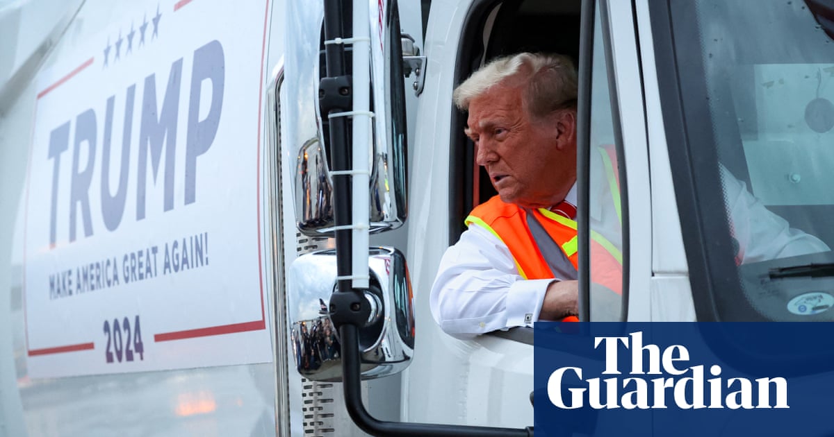 Trump stages garbage truck stunt in bid to turn tables over Puerto Rico backlash | US elections 2024