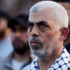 Hamas leader Yahya Sinwar looks on as Palestinian Hamas supporters take part in an anti-Israel rally over tension in Jerusalem's Al-Aqsa Mosque, in Gaza City, Oct. 1, 2022.