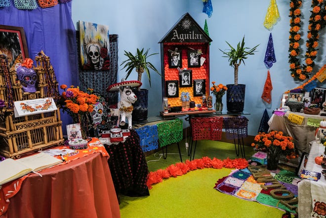 Details of the community ofrendas on exhibit through Sunday, November 3rd at the State of Michigan Museum and sponsored by Casa de Rosado Galeria and Cultural Center in Lansing. Friday, Nov. 1, 2024.